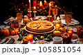 Thanksgiving pumpkin pie is elegantly served with candles on a wooden table  105851054