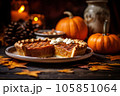 Thanksgiving pumpkin pie revealing a rich golden spiced filling is elegantly served on a rustic wooden table  105851064