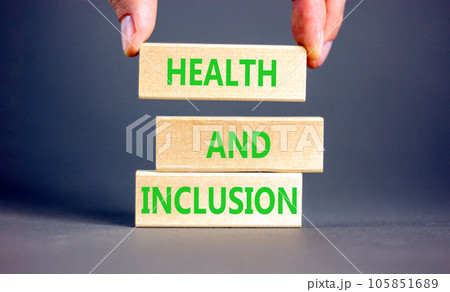 Health and inclusion symbol. Concept words Health and inclusion on wooden block. Beautiful grey table grey background. Doctor hand. Business motivational health and inclusion concept. Copy space. Health and inclusion symbol. Concept words Health and inclusion on wooden block. Beautiful grey table grey background. Doctor hand. Business motivational health and inclusion concept. Copy space. 105851689