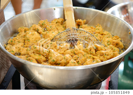 fried fish-paste balls on the stainless steel plate in the restaurant fried fish-paste balls on the stainless steel plate in the restaurant 105851849