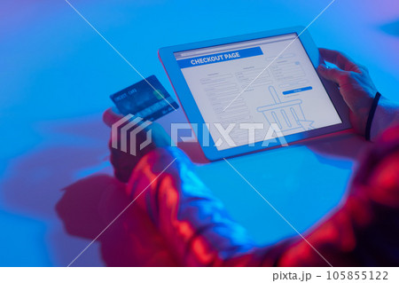 woman using digital tablet and making online shopping 105855122