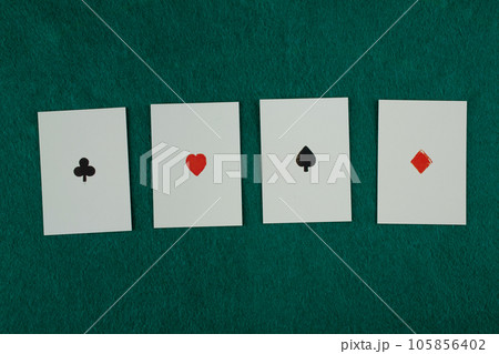 Old west era playing cards on gambling table. Four of a kind, aces. Old west era playing cards on gambling table. Four of a kind, aces. 105856402