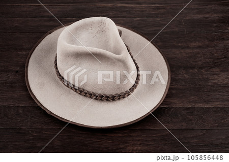 Old west hat on table. Top view. Old west hat on table. Top view. 105856448