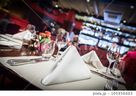 Fine table setting in luxurious restaurant 105856883