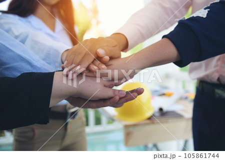 Diverse multiethnic Partners hands together teamwork group of multiracial people meeting join hands togetherness. Diversity people hands join empower partnership teams connection volunteer community 105861744