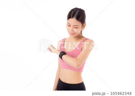 Happy young asian woman looking smartwatch for exercise and aerobics with cardio isolated. Happy young asian woman looking smartwatch for exercise and aerobics with cardio isolated. 105862348