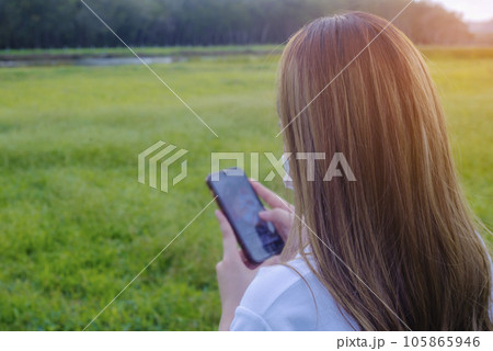 Women with smartphone mobile online social network Women with smartphone mobile online social network 105865946