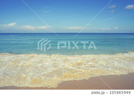 Blue sea with beach sand landscape nature in blue sky sunshine day Blue sea with beach sand landscape nature in blue sky sunshine day 105865949