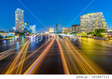 cityscape at night chao phraya river of bangkok city landscape Thailand , long exposure light 105867111