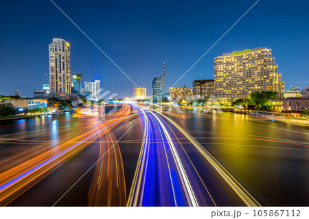 cityscape at night chao phraya river of bangkok city landscape Thailand , long exposure light 105867112