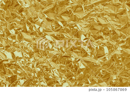 Gold foil leaf shiny texture, abstract yellow wrapping paper for background and design art work. Gold foil leaf shiny texture, abstract yellow wrapping paper for background and design art work. 105867869