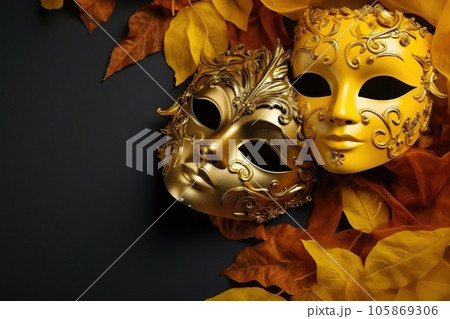 Venetian carnival mask with gold decorations on yellow background. 105869306