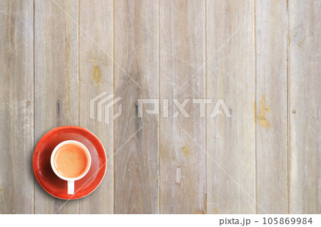 Cup of coffee on wooden table background 105869984