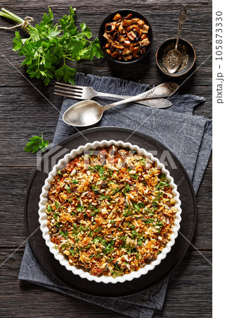 mushrooms ground meat casserole in dish, top view 105873330