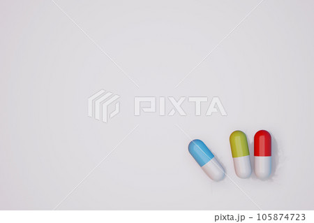 3d rendering of three capsules of medicine on white background 105874723