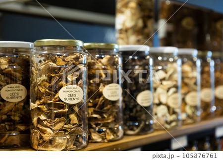Dried mushrooms in jars for sale Dried mushrooms in jars for sale 105876761