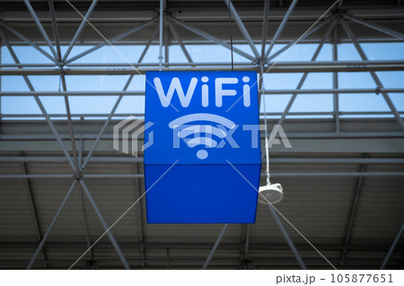 Free wi-fi station in a public place. Free Wi-Fi sign at the airport or other public place to connect. Free wi-fi station in a public place. Free Wi-Fi sign at the airport or other public place to connect. 105877651
