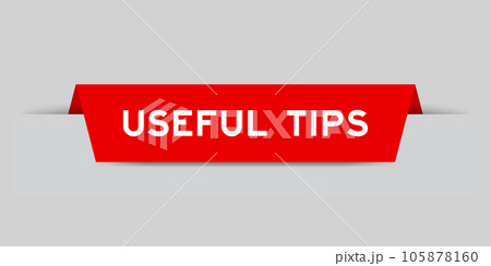 Red color inserted label with word useful tips on gray background 105878160