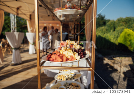 A large selection of food and different snacks in the oncoming zone of guests. A buffet for guests A large selection of food and different snacks in the oncoming zone of guests. A buffet for guests 105878941