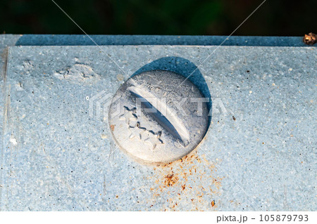 Old Metal male circle nut screw nail heads attached to the steel plate railing bridge. Bolts and screws. To attach structure of wall to be strong for wall of house or various industrial applications.	 105879793