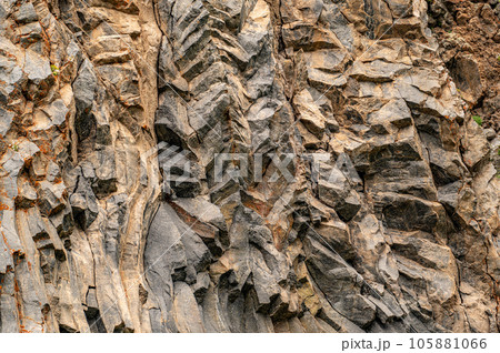 natural stone background texture. rock formation, unusual mountain topography, geological backdrop. Basalt columns formation 105881066