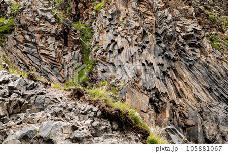 natural stone background texture. rock formation, unusual mountain topography, geological backdrop. Basalt columns formation 105881067