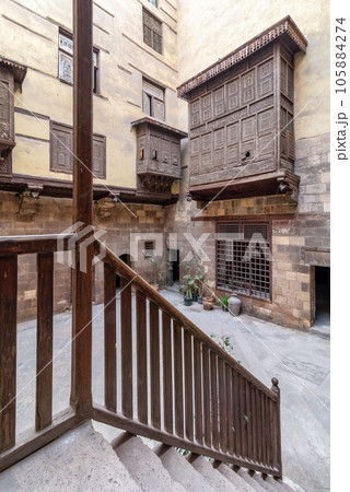 Courtyard of ottoman historic house of Zeinab Khatoun with wooden oriel windows Courtyard of ottoman historic house of Zeinab Khatoun with wooden oriel windows 105884274