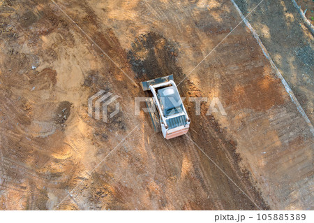 Use tractor in landscaping allows for easy movement of heavy materials such as soil, plants. 105885389