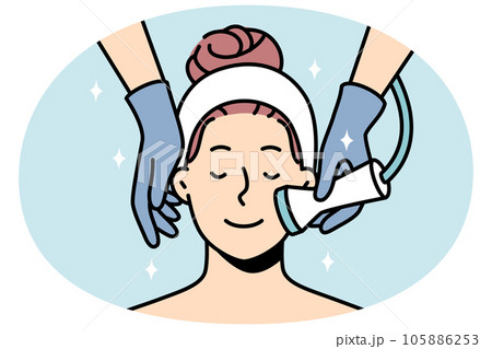 Woman enjoy face care treatment in salon 105886253