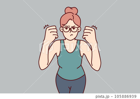 Woman clenches fists demonstrating willingness to fight and feeling desire to beat offender 105886939