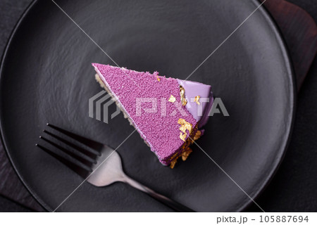 Delicious fresh sweet mousse cake with berry filling Delicious fresh sweet mousse cake with berry filling 105887694