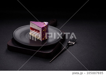 Delicious fresh sweet mousse cake with berry filling 105887695