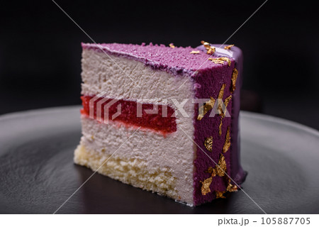 Delicious fresh sweet mousse cake with berry filling 105887705