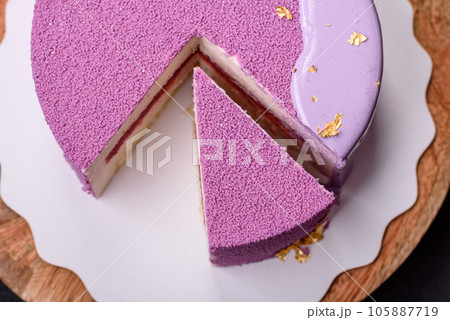 Delicious fresh sweet mousse cake with berry filling 105887719