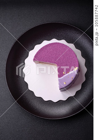 Delicious fresh sweet mousse cake with berry filling 105887742