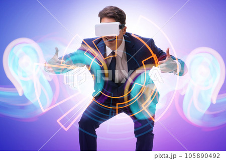 Virtual reality concept with man and VR goggles Virtual reality concept with man and VR goggles 105890492