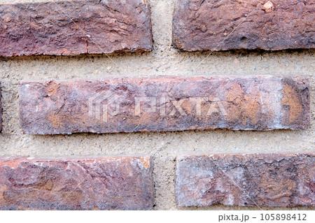 Brick wall background texture of old material 105898412