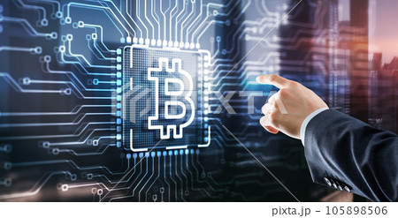 Businessman clicking on virtual screen Bitcoin Cryptocurrency concept. Mining factory. Server racks background Businessman clicking on virtual screen Bitcoin Cryptocurrency concept. Mining factory. Server racks background 105898506