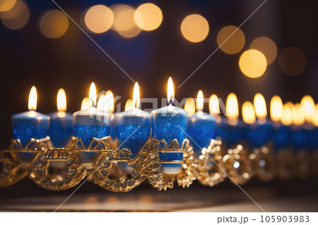 Close-up of a beautifully lit Hanukkah menorah. Hanukkah decoration with candles Close-up of a beautifully lit Hanukkah menorah. Hanukkah decoration with candles 105903983