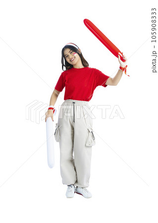 Indonesian girl supporting Indonesian team when competing 105908333