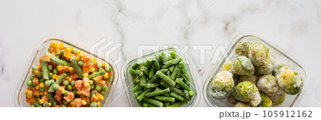 Frozen vegetables in containers 105912162