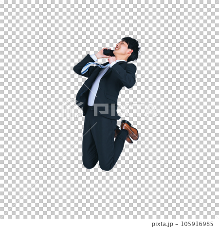 A young businessman jumping while talking on a smartphone background transparent PNG A young businessman jumping while talking on a smartphone background transparent PNG 105916985
