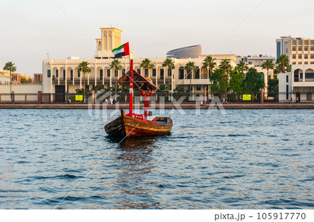 Traditional national boat Abra in the bay of the old city of Dubai. Used as a ferry to the market. Traditional national boat Abra in the bay of the old city of Dubai. Used as a ferry to the market. 105917770