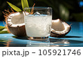 Coconut milk and shells, Glass of coconut water put on wooden background. 105921746