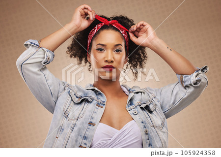 Fashion, aesthetic and portrait of woman with hipster style isolated in a studio brown background feeling confident. Proud, cool and young creative person with funky clothing and beauty as a designer 105924358