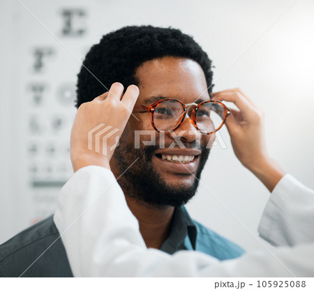 Black man, glasses and hands, vision and eye care, test and optometry with health and smile. Prescription lens, frame choice and healthcare, eyewear and optometrist with wellness and medical service 105925088