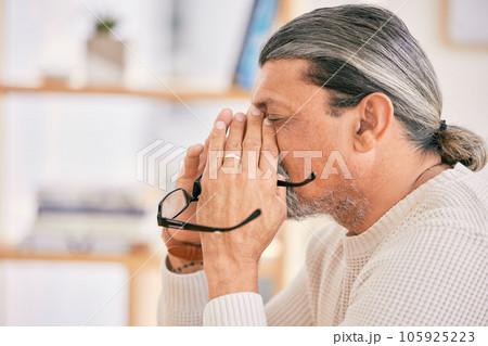 Frustrated senior man, headache and stress in debt, burnout or financial crisis at home. Mature male person with migraine, eye strain or anxiety in depression, mental health or pain or overworked 105925223
