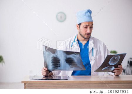 Young male doctor radiologist working in the clinic 105927952