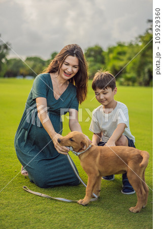 A heartwarming moment captured in the park as a pregnant woman after 40 shares a special bond with her teenage son, embracing the beauty of mother-daughter connection 105929360