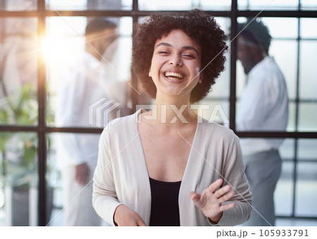business woman with her staff in background at office business woman with her staff in background at office 105933791